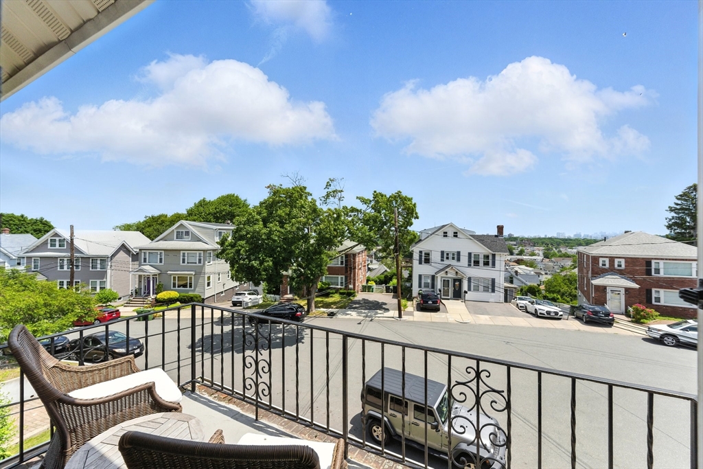 29 Hillcrest Circle, Unit 2 Watertown, MA 02472 - Photo 22 of 36 a view of a building from a balcony