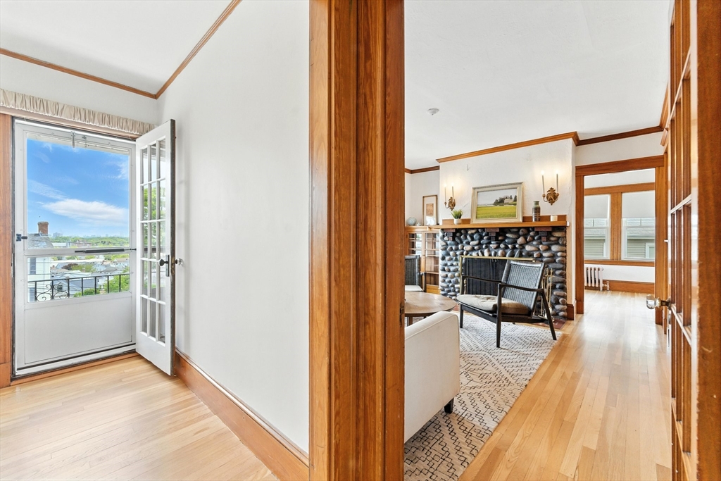 29 Hillcrest Circle, Unit 2 Watertown, MA 02472 - Photo 25 of 36 a view of a entryway door and dining room