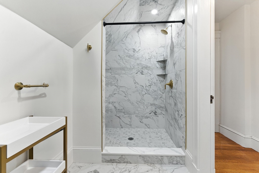 29 Hillcrest Circle, Unit 2 Watertown, MA 02472 - Photo 28 of 36 a bathroom with a shower