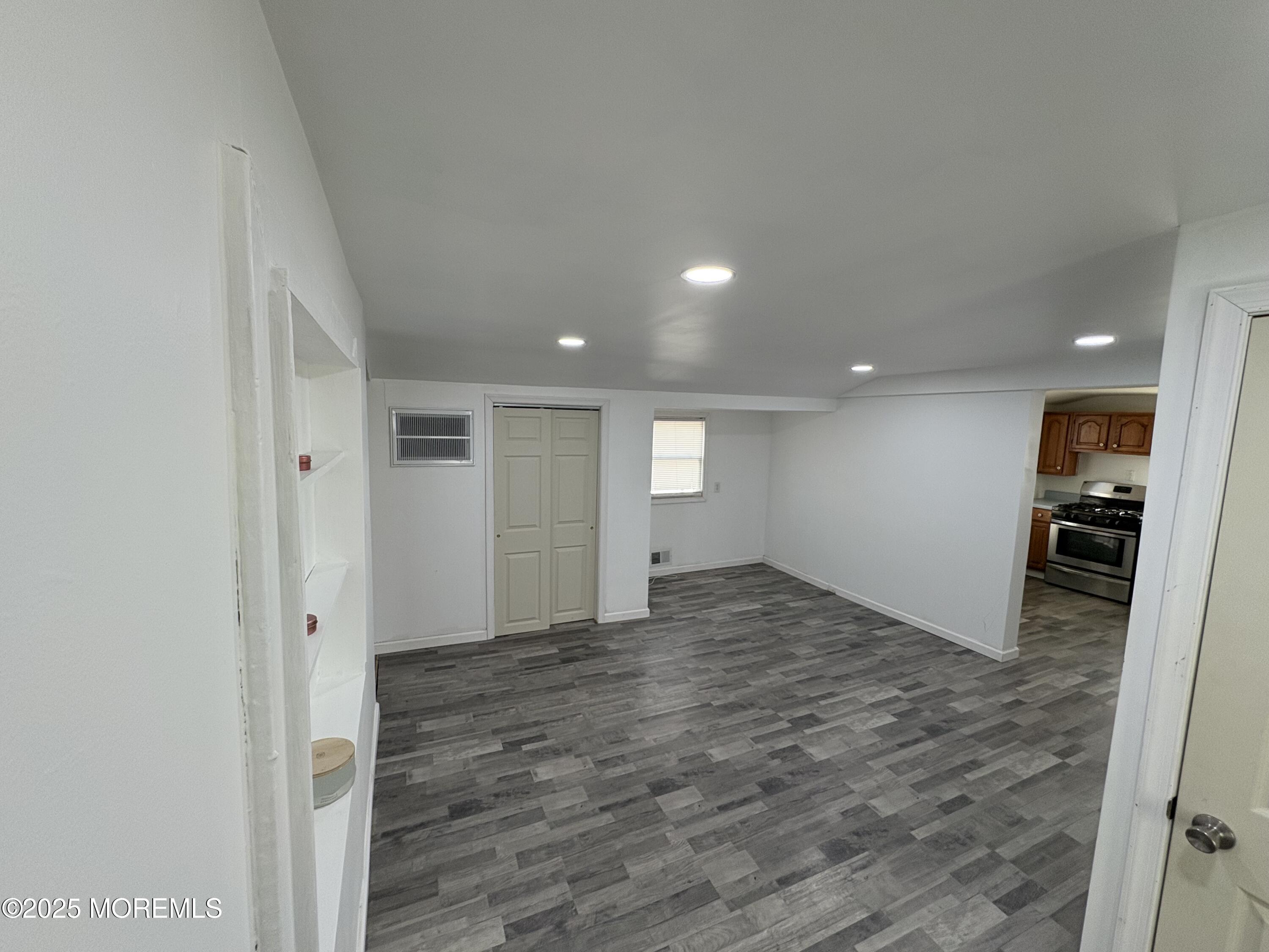 276 Linden Avenue North Middletown, NJ 07748 - Photo 7 of 15 a view of empty room with wooden floor