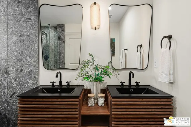 a bathroom with a shower and toilet