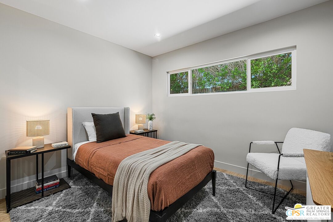 1433 North Fiesta Road Palm Springs, CA 92262 - Photo 23 of 30 a bedroom with a bed and a window