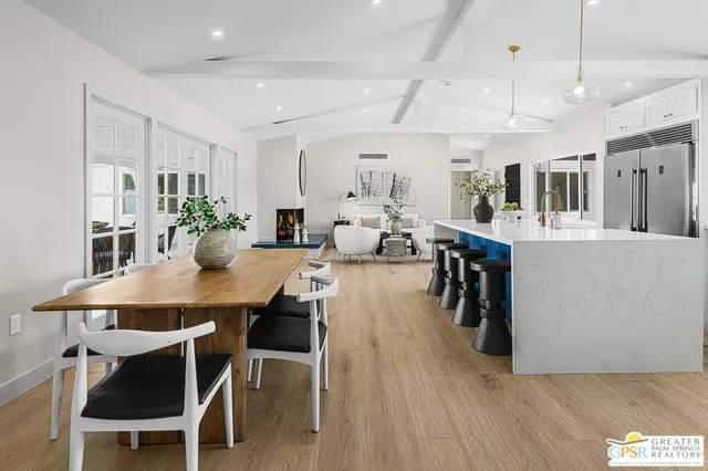 a kitchen with a sink cabinets and window