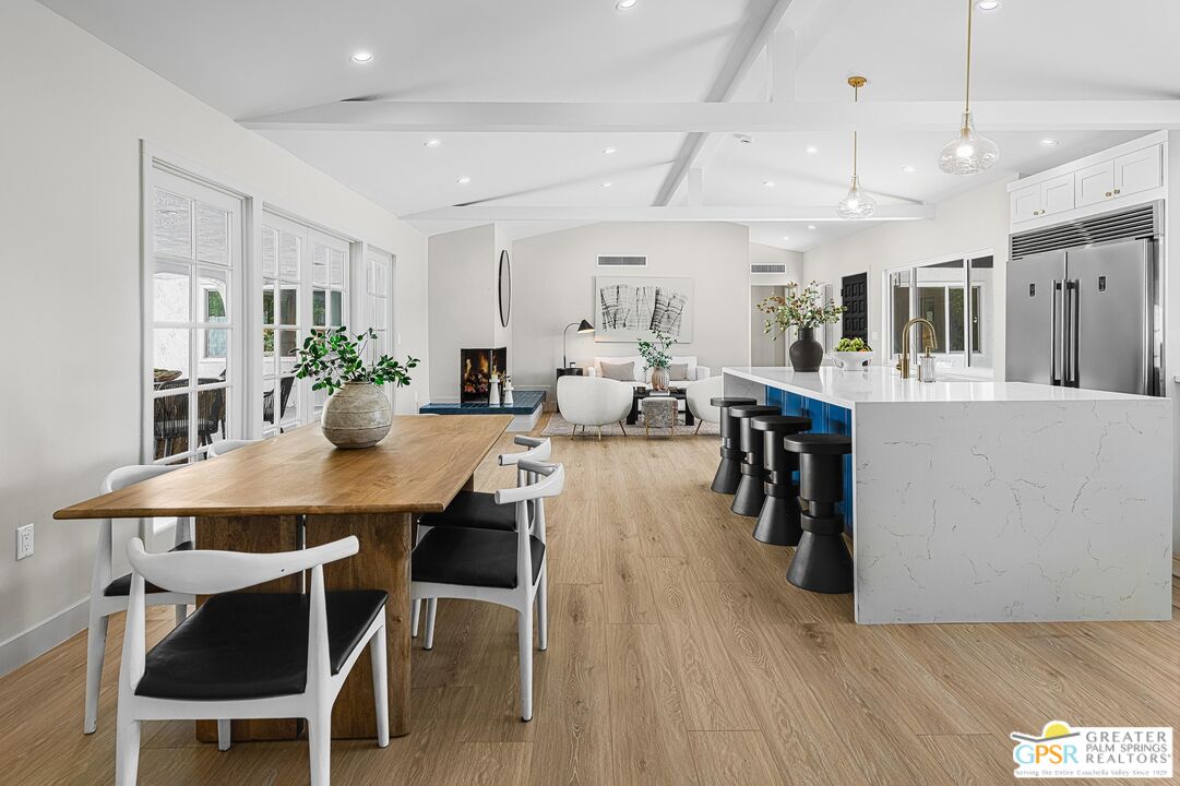 1433 North Fiesta Road Palm Springs, CA 92262 - Photo 6 of 30 a view of a dining room with furniture window and wooden floor