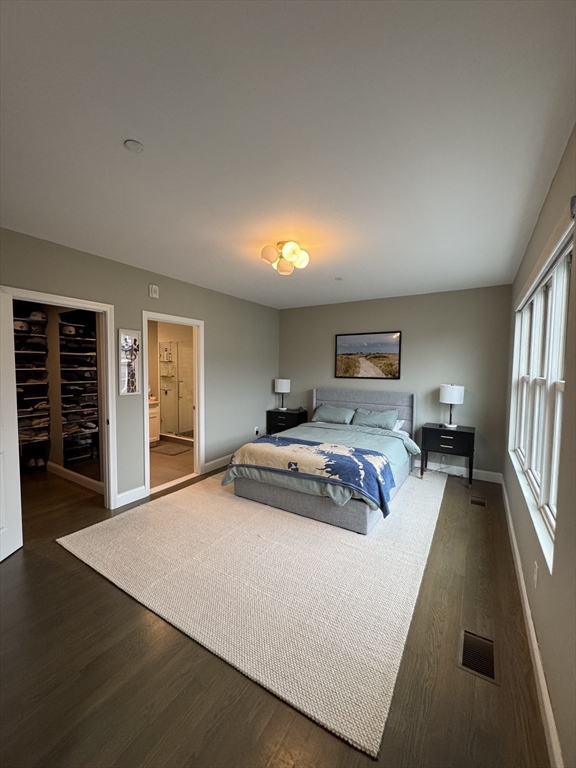 278 West Fifth Street, Unit 1 Boston, MA 02127 - Photo 14 of 22 a bedroom with a bed and a large window