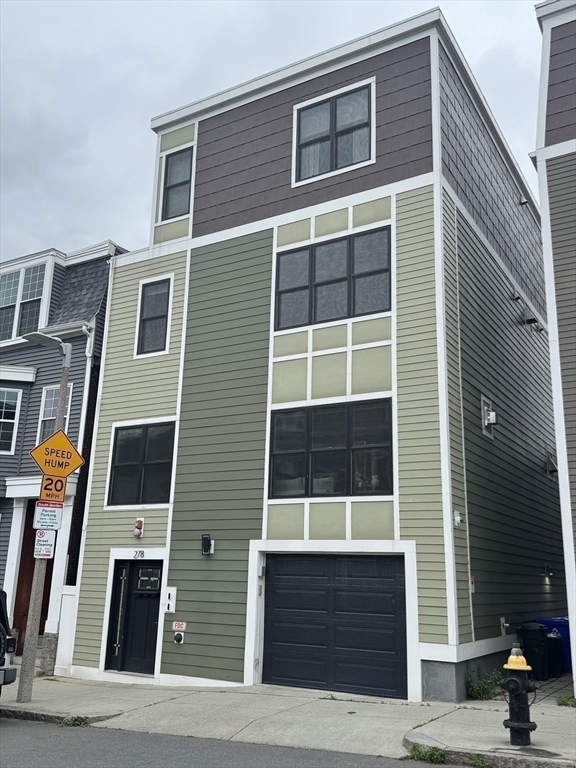 278 West Fifth Street, Unit 1 Boston, MA 02127 - Photo 22 of 22 a front view of a house with a street