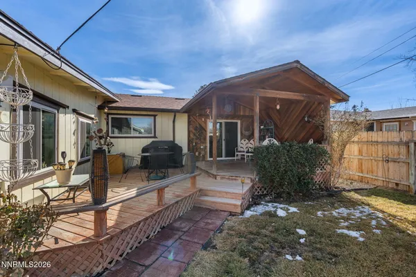 a view of living room filled with furniture