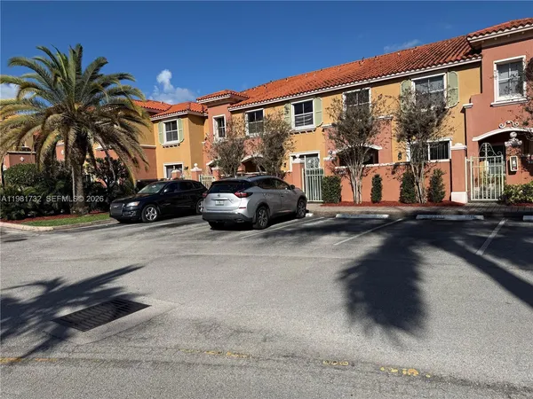 a view of a street with cars