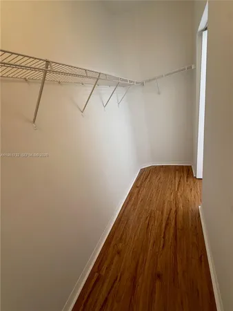 a view of a room with racks on the wall