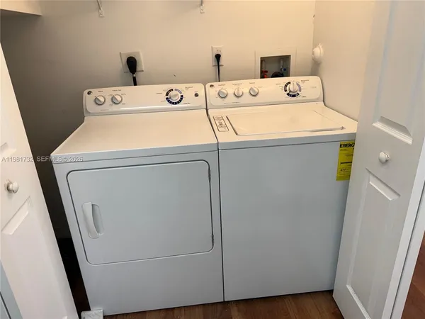 a utility room with dryer and washer