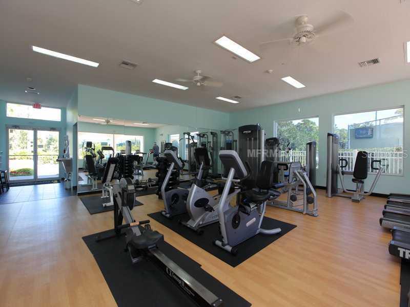 8911 Veranda Way, Unit 222 Sarasota, FL 34238 - Photo 19 of 25 a view of a room with gym equipment