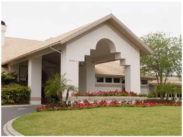 a view of a swimming pool with a bench