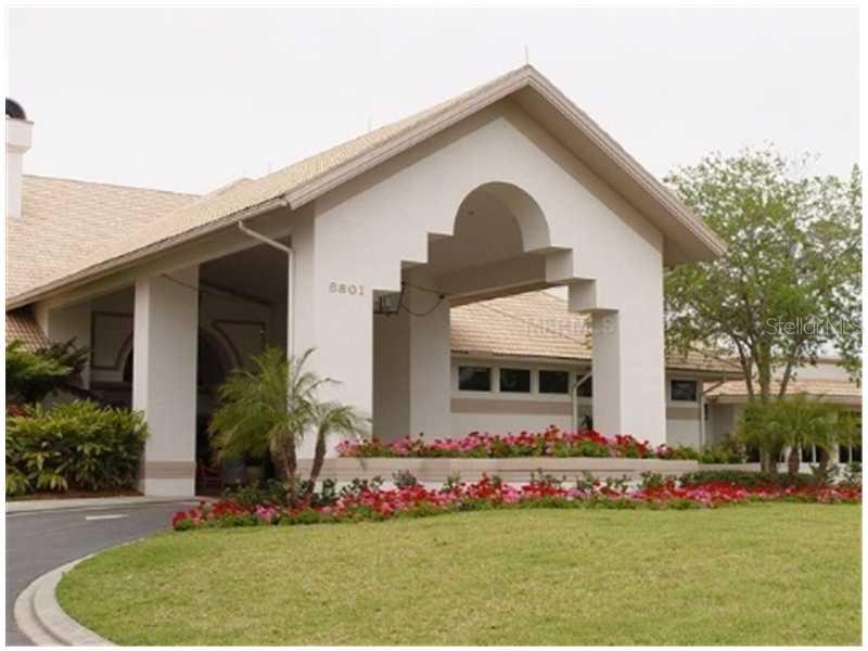 8911 Veranda Way, Unit 222 Sarasota, FL 34238 - Photo 24 of 25 a front view of house with yard