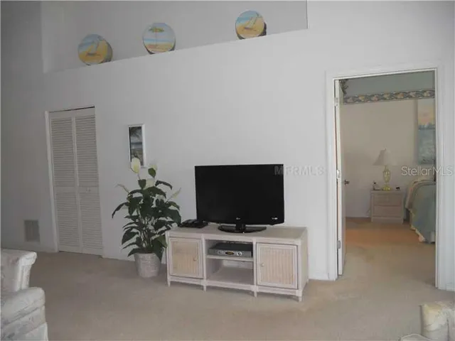 a kitchen with a sink cabinets and window