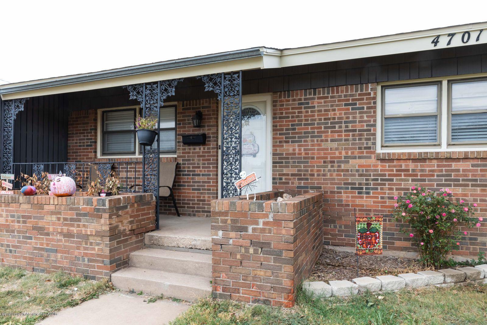 4701 South Milam Street Amarillo, TX 79110 - Photo 1 of 32 a front view of a house with patio