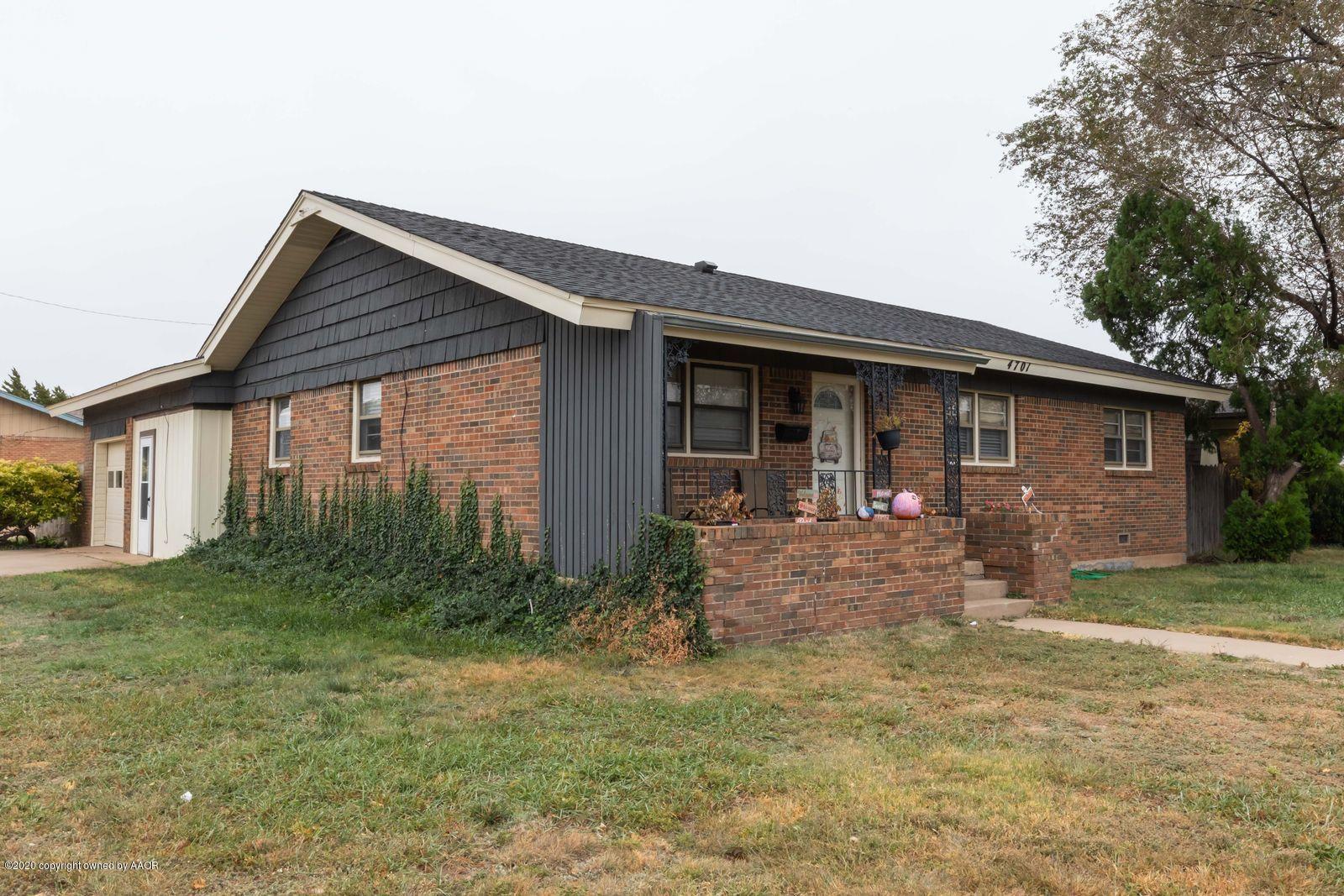 4701 South Milam Street Amarillo, TX 79110 - Photo 4 of 32 a view of a house with backyard