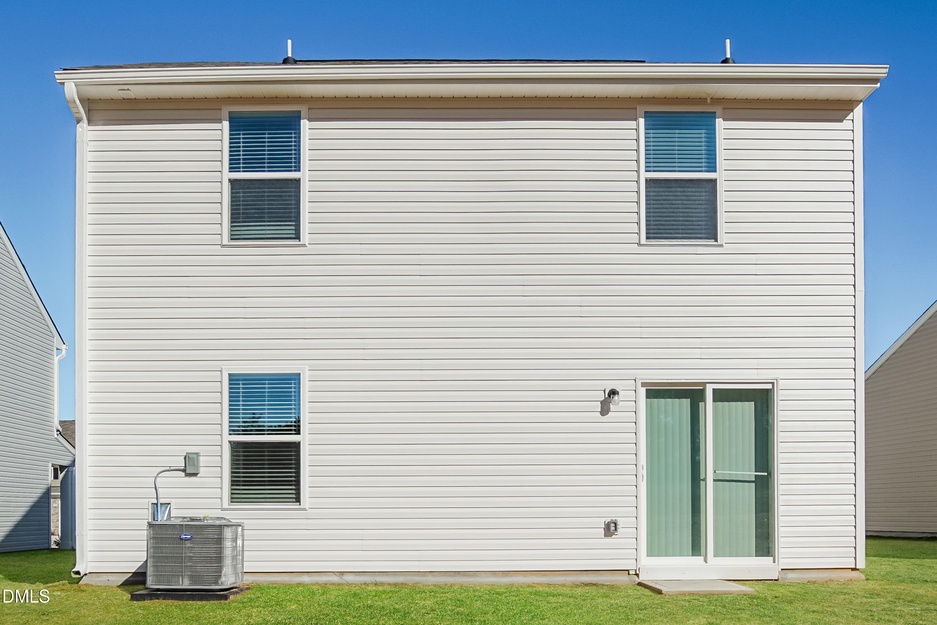 209 Indian Summer Street Zebulon, NC 27597 - Photo 15 of 17 a view of a house with a yard and a porch