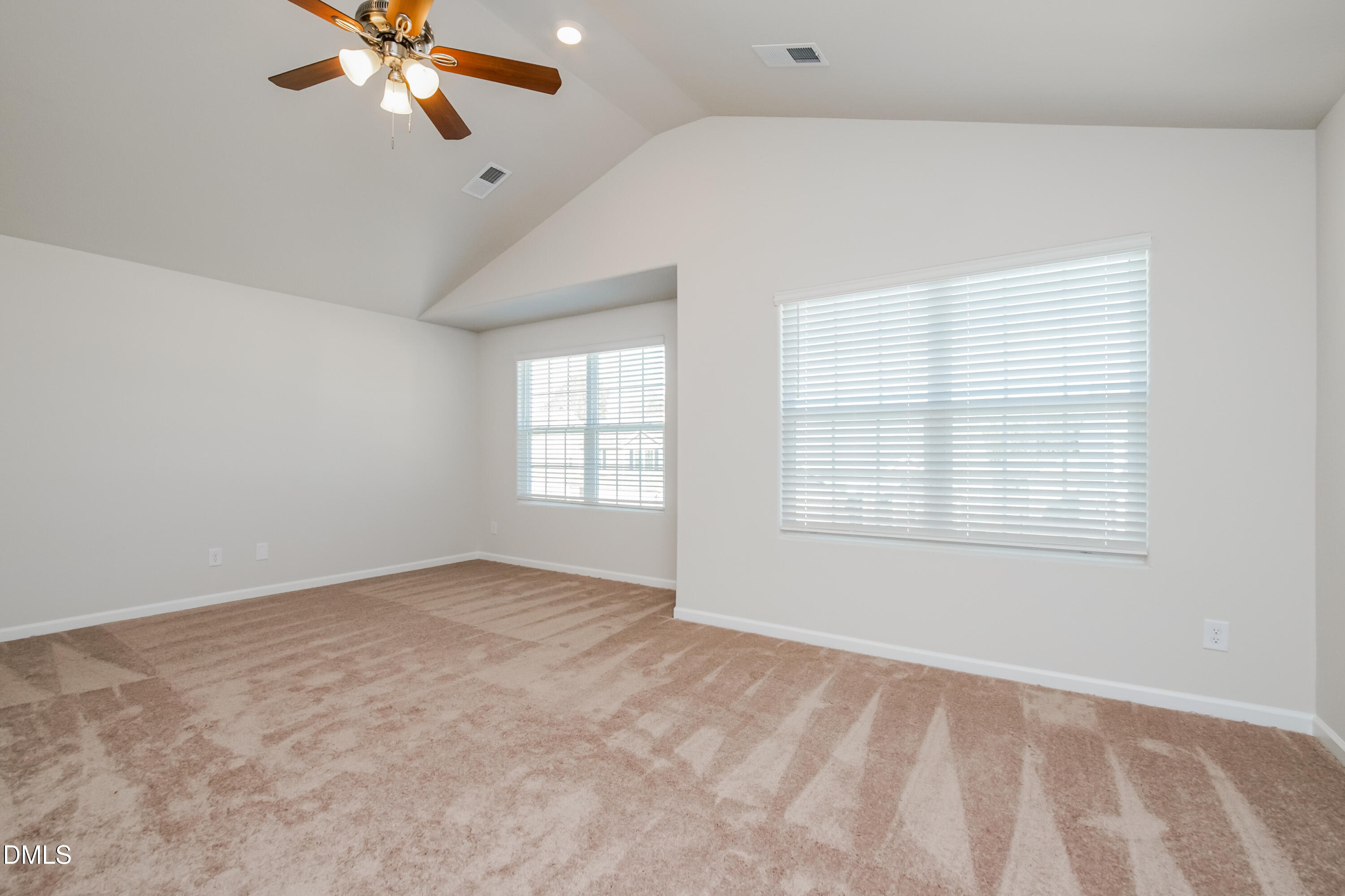 209 Indian Summer Street Zebulon, NC 27597 - Photo 8 of 17 a view of an empty room with a window