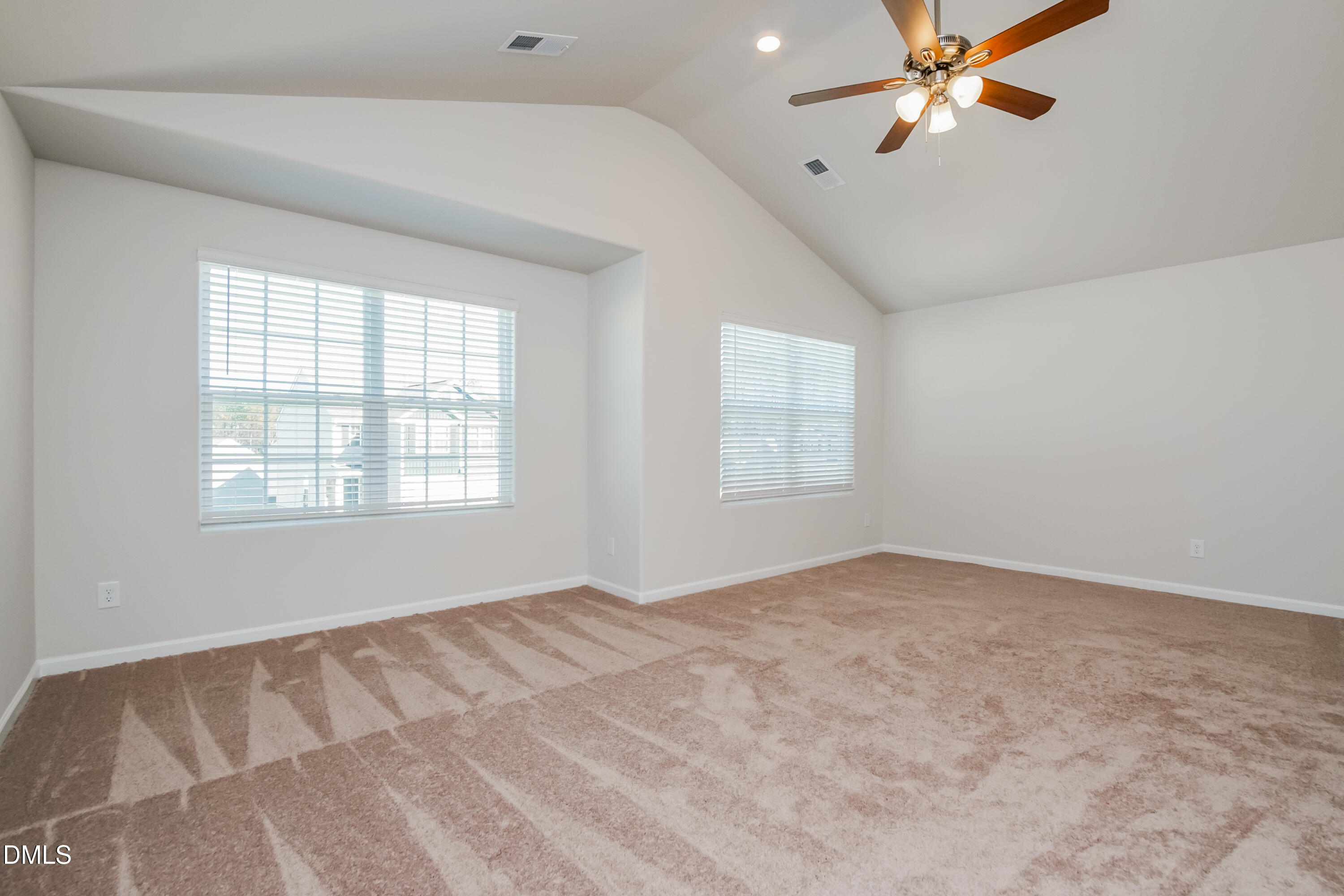 209 Indian Summer Street Zebulon, NC 27597 - Photo 9 of 17 a view of an empty room with a window
