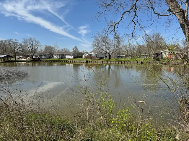 a view of a lake with houses