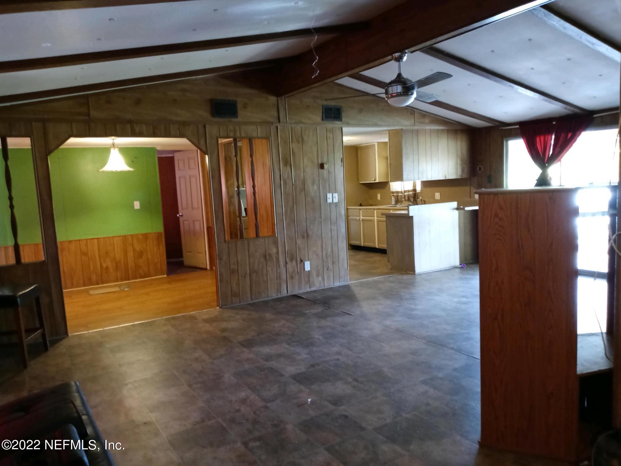 763 Georgetown Denver Road, Unit 1 Crescent City, FL 32112 - Photo 6 of 29 Great Room, Dining Room & Kitchen