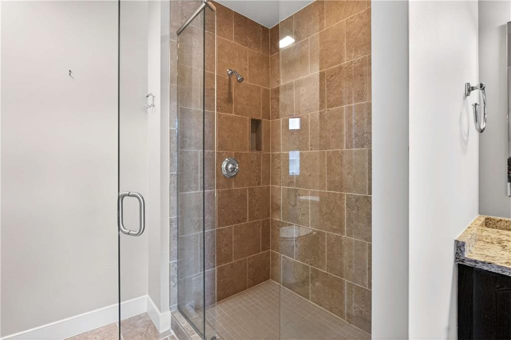 201 West Ponce De Leon Avenue, Unit 702 Decatur, GA 30030 - Photo 29 of 41 a bathroom with a shower