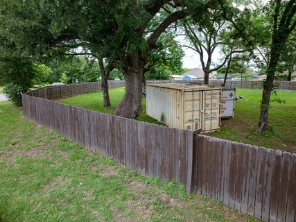 a view of a wooden fence