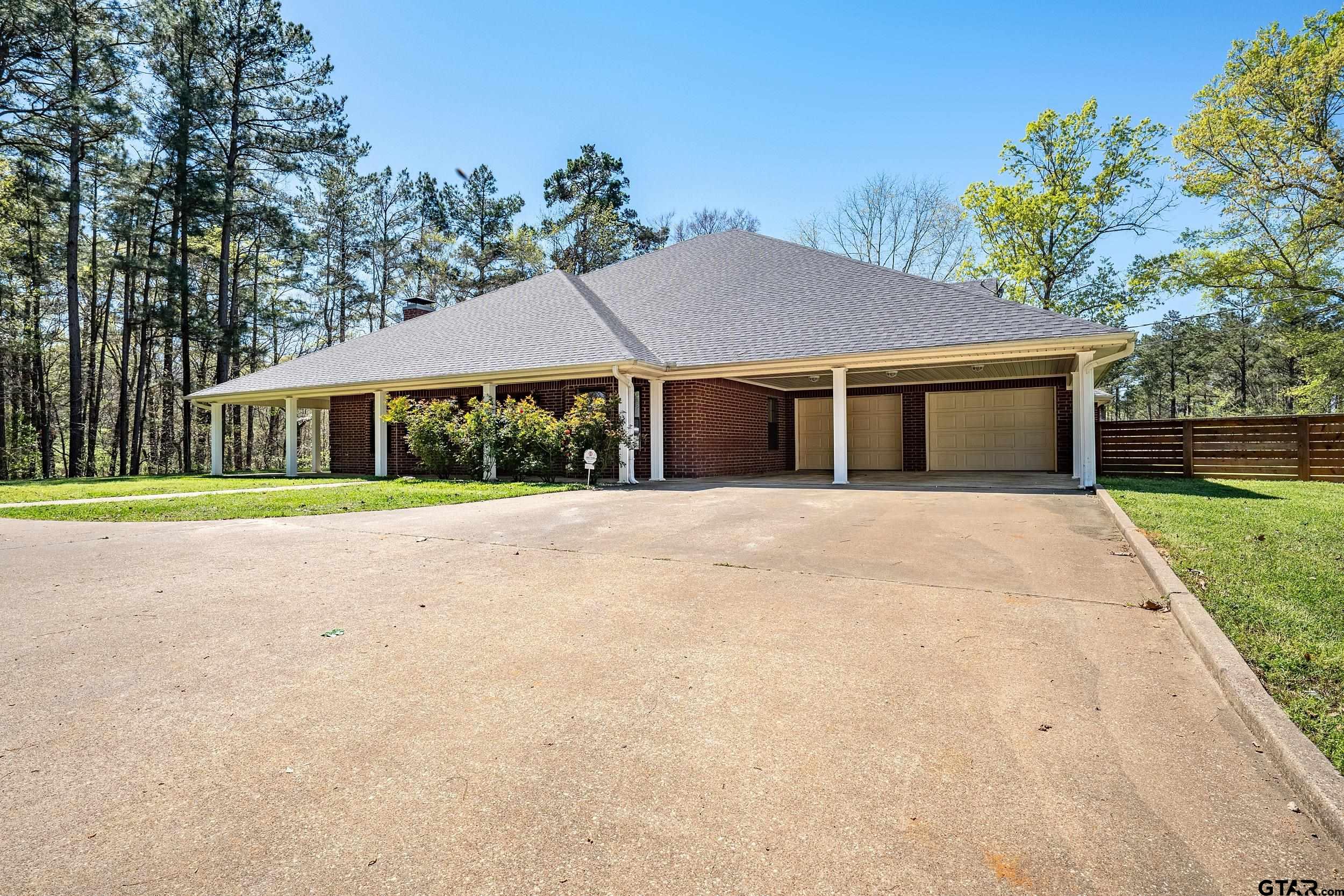 3481 Loop 343 Rusk, TX 75785 - Photo 1 of 48 a house with a garden space