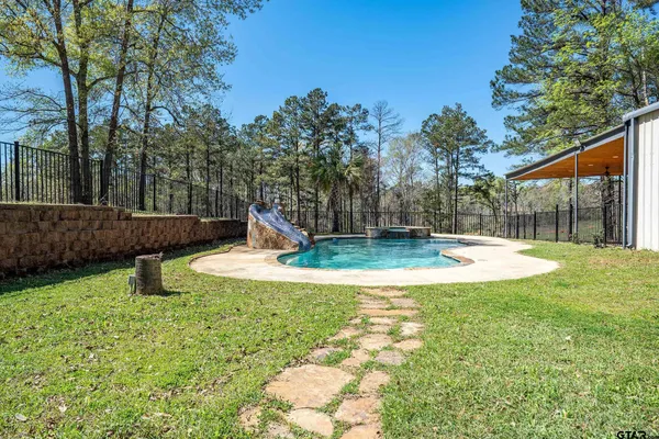 a view of a garden with a slide