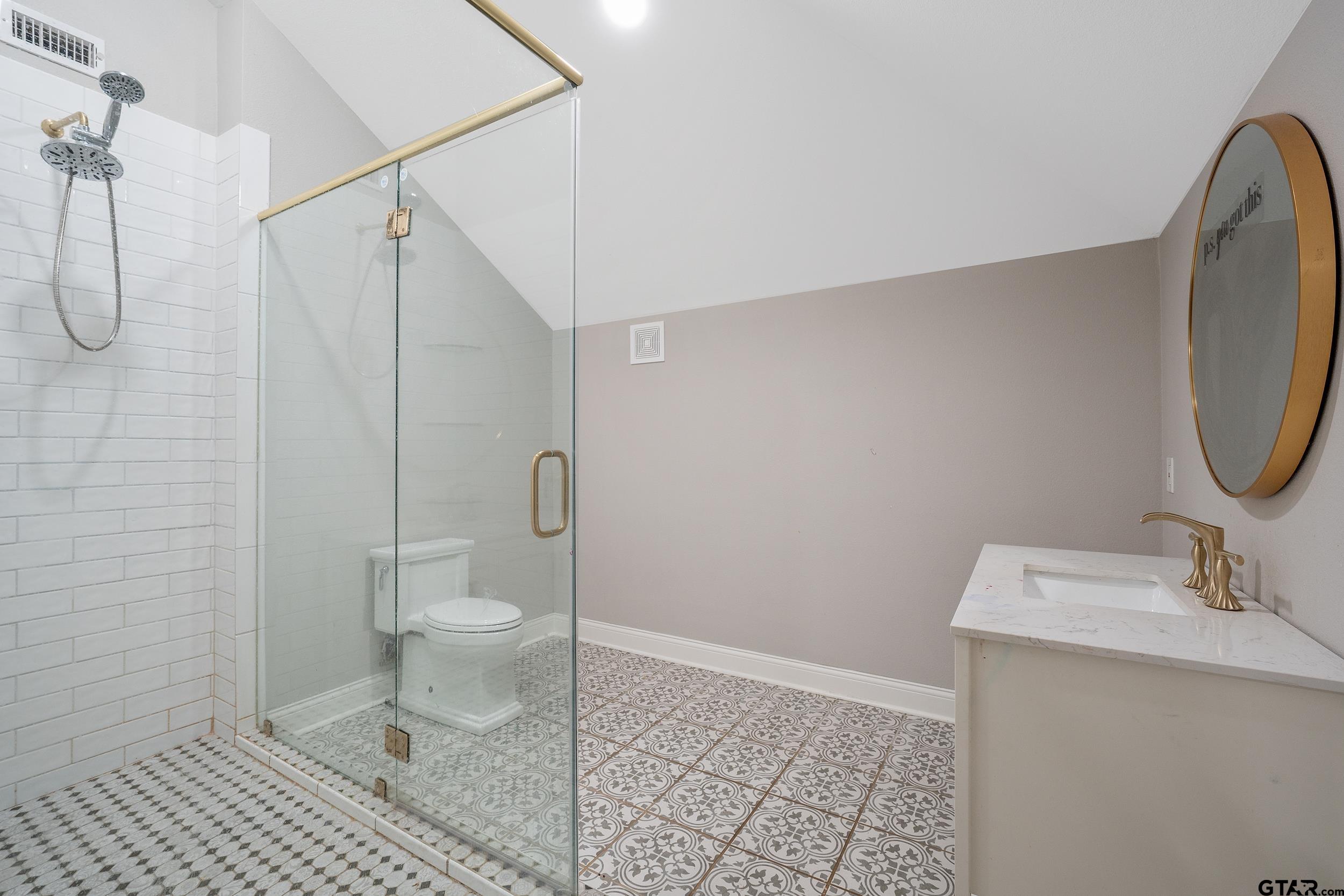 3481 Loop 343 Rusk, TX 75785 - Photo 22 of 48 a bathroom with a sink a toilet and a shower