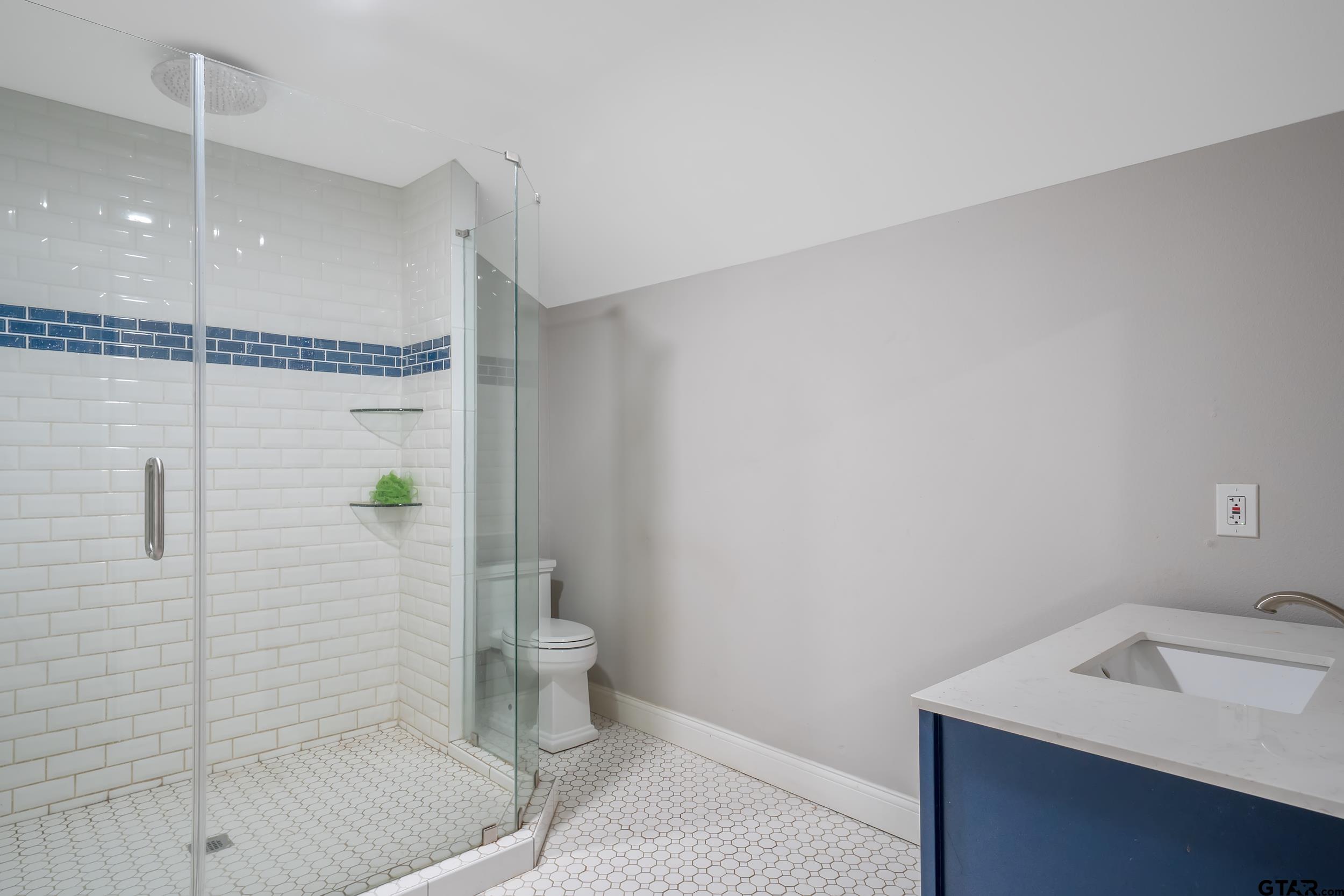3481 Loop 343 Rusk, TX 75785 - Photo 23 of 48 a bathroom with a sink and toilet
