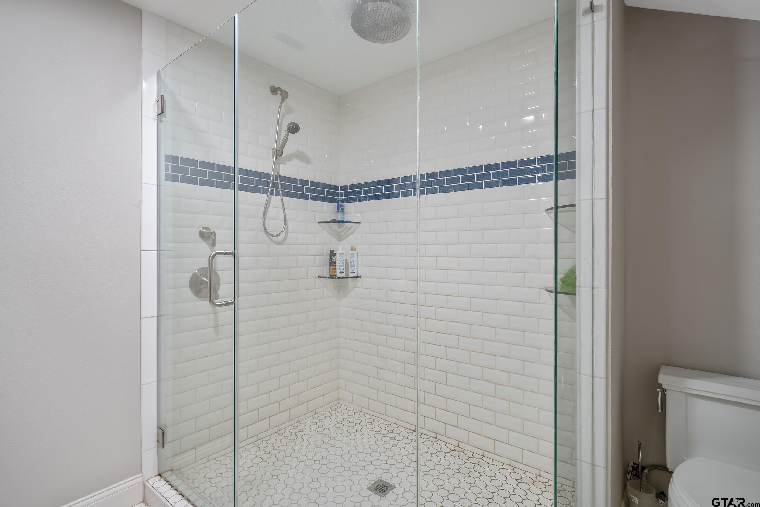 3481 Loop 343 Rusk, TX 75785 - Photo 38 of 48 a bathroom with a shower and toilet