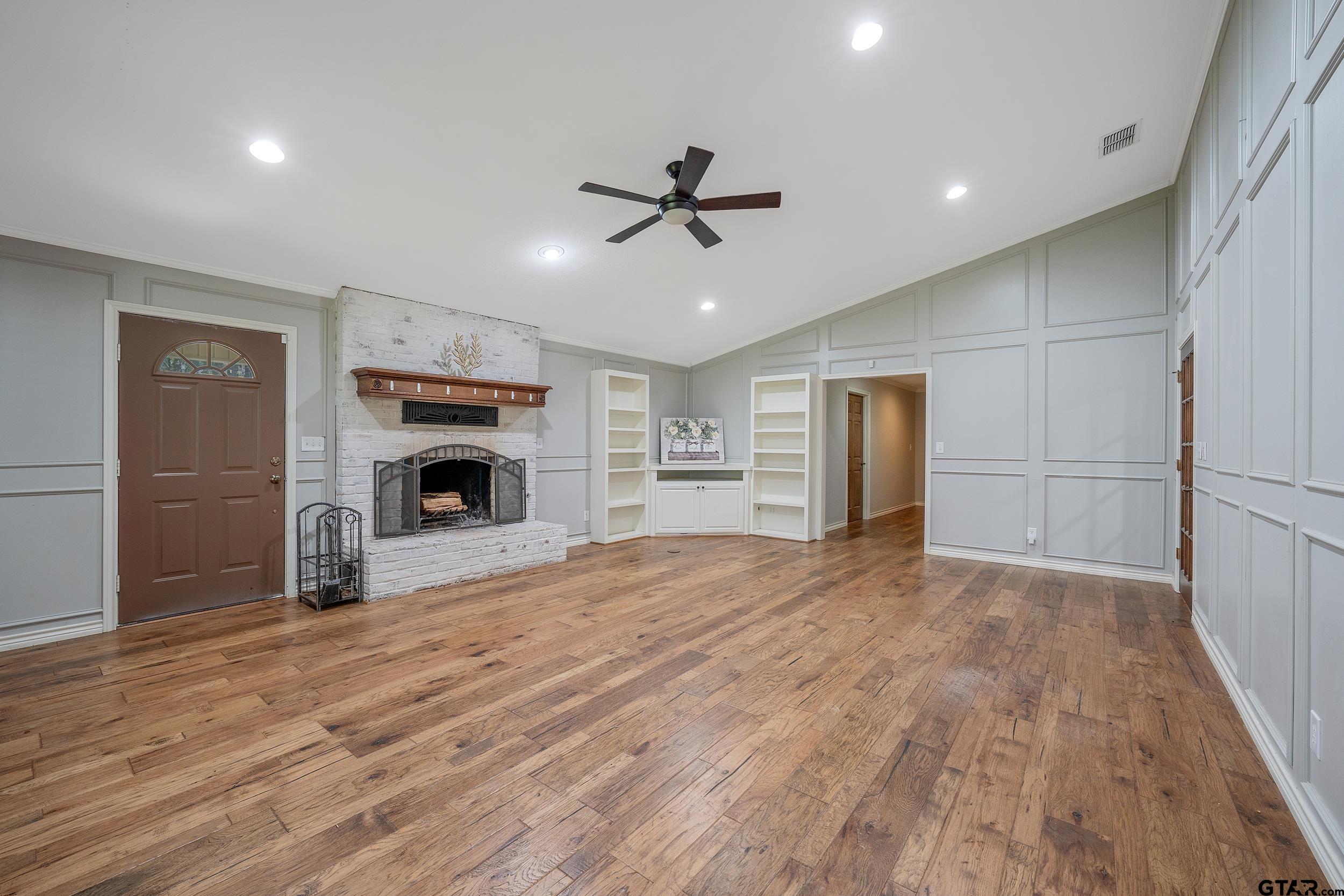 3481 Loop 343 Rusk, TX 75785 - Photo 44 of 48 a view of empty room with kitchen and fireplace