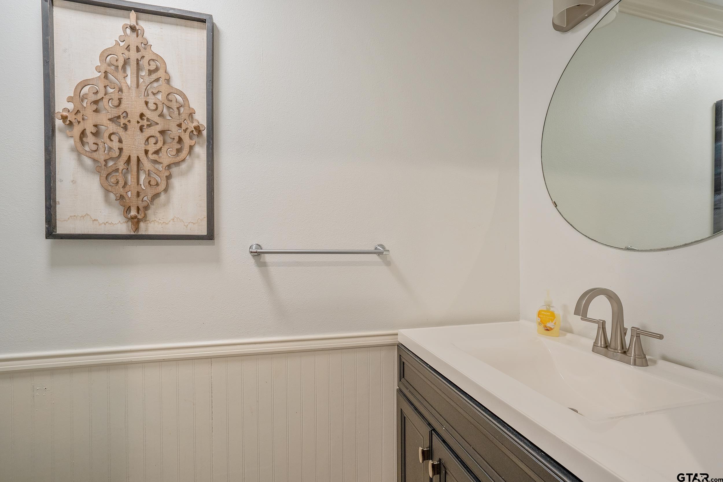 3481 Loop 343 Rusk, TX 75785 - Photo 45 of 48 a bathroom with a sink and a mirror