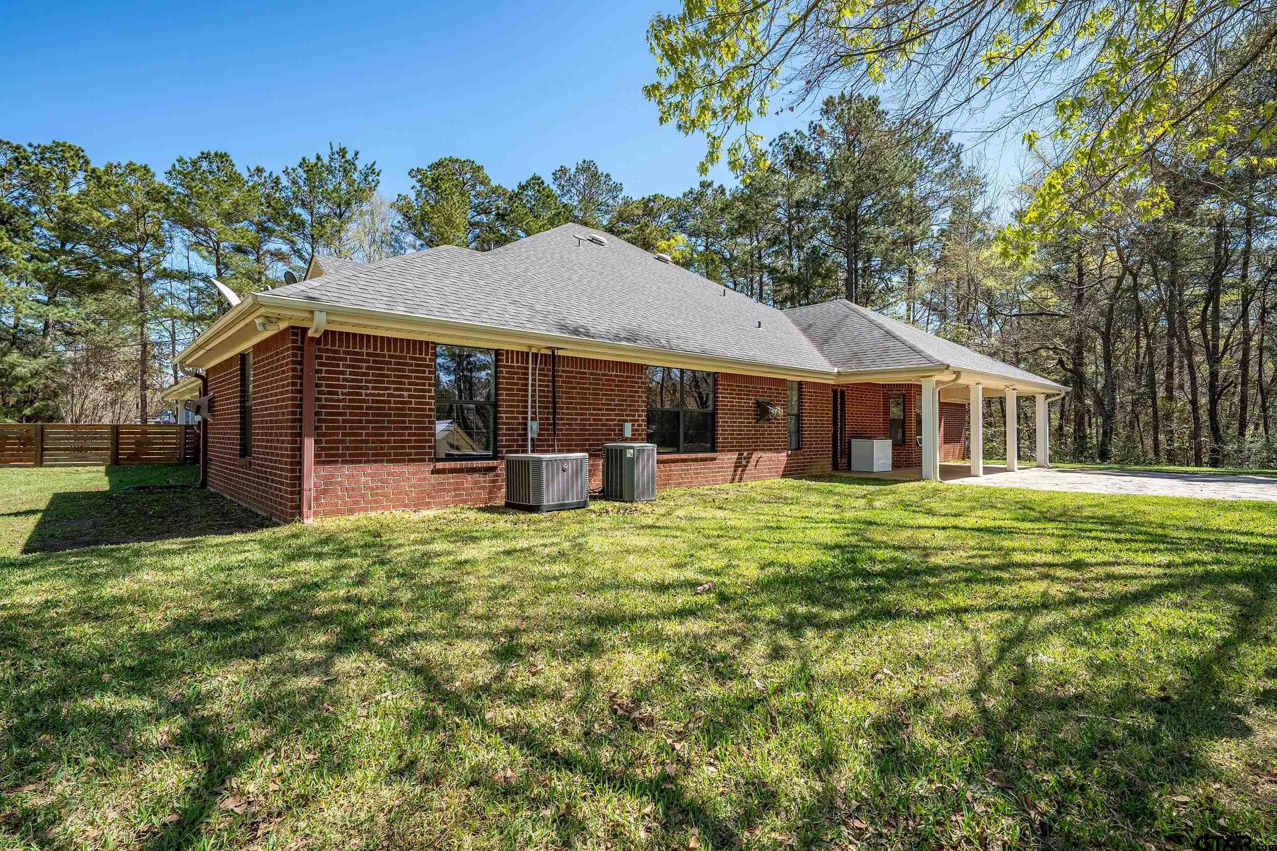 3481 Loop 343 Rusk, TX 75785 - Photo 10 of 48 a front view of house with yard outdoor seating and green space
