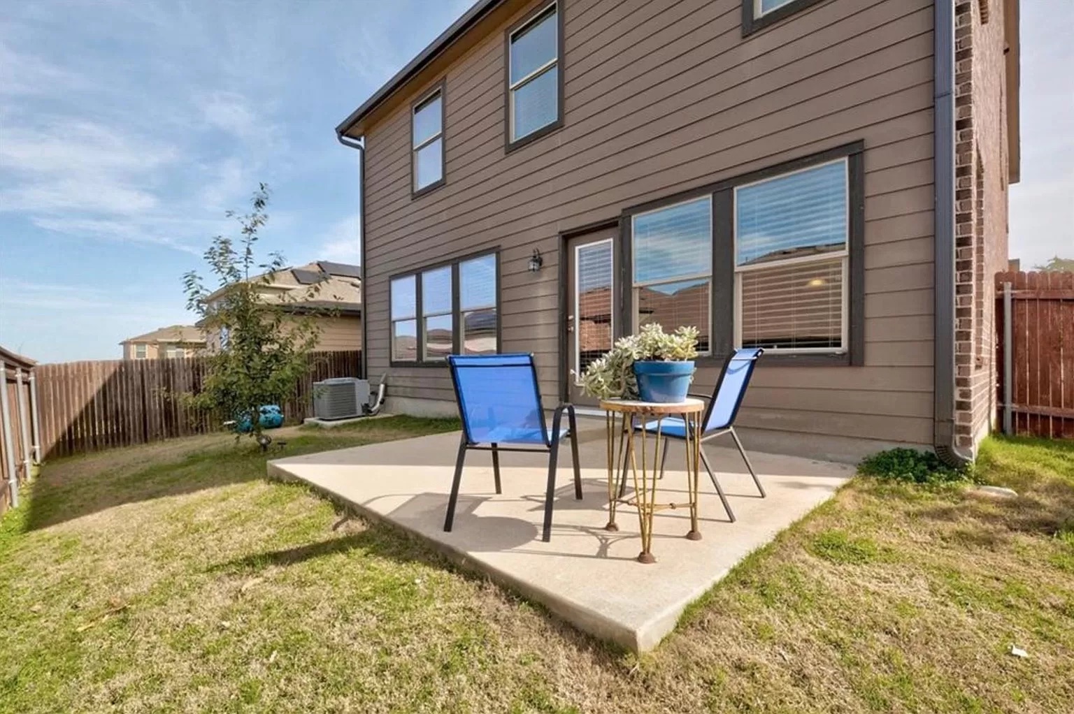 9016 Ridgewell Road Austin, TX 78747 - Photo 27 of 30 An inviting backyard patio offers a perfect spot for relaxation and outdoor enjoyment.