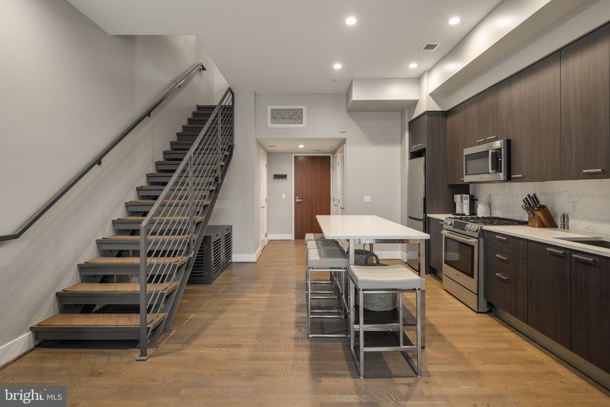 525 Southwest Water Street Southwest, Unit 404 Washington, DC 20024 - Photo 4 of 82 Modern kitchen with sleek design.