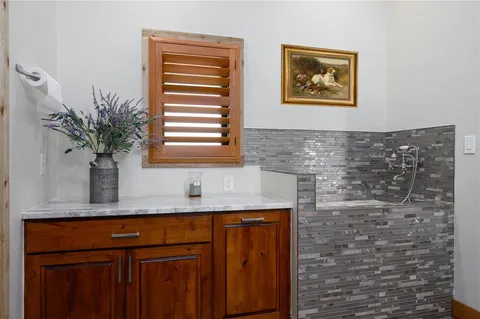 a view of a swimming pool with a deck