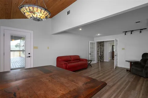 a kitchen with stainless steel appliances granite countertop a sink and cabinets
