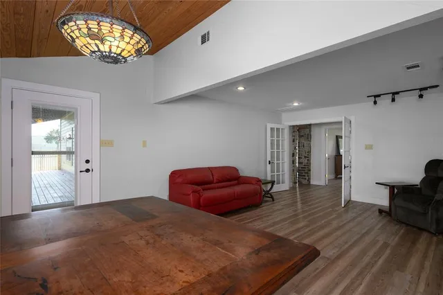 a kitchen with stainless steel appliances granite countertop a sink and cabinets