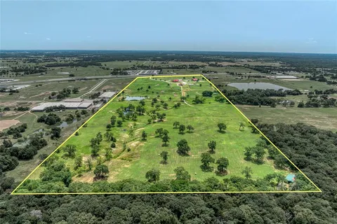 a view of a garden with an outdoor space