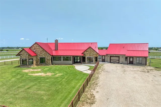 a view of a center island and chandelier