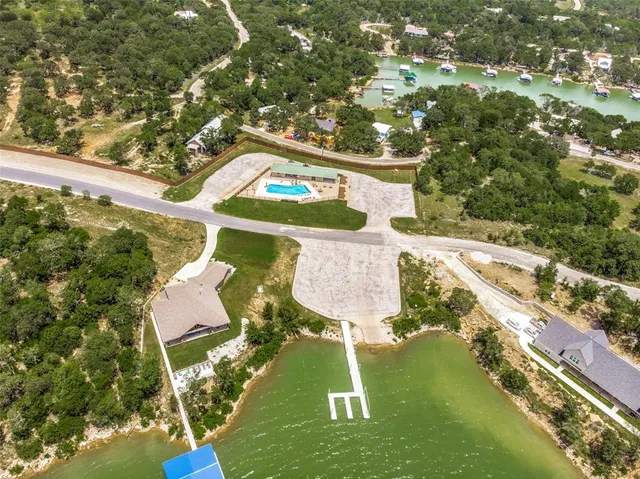 a view of a lake with a yard