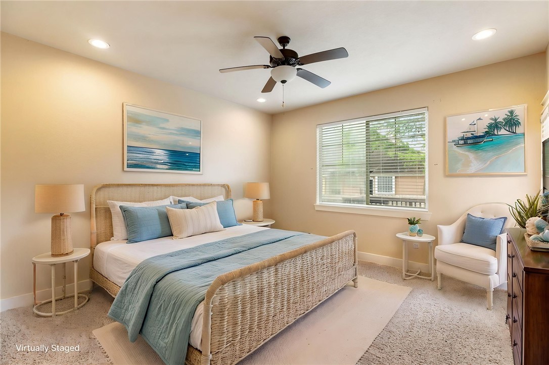 2136 Rockcliffe Loop College Station, TX 77845 - Photo 28 of 48 a bedroom with a bed and a chandelier