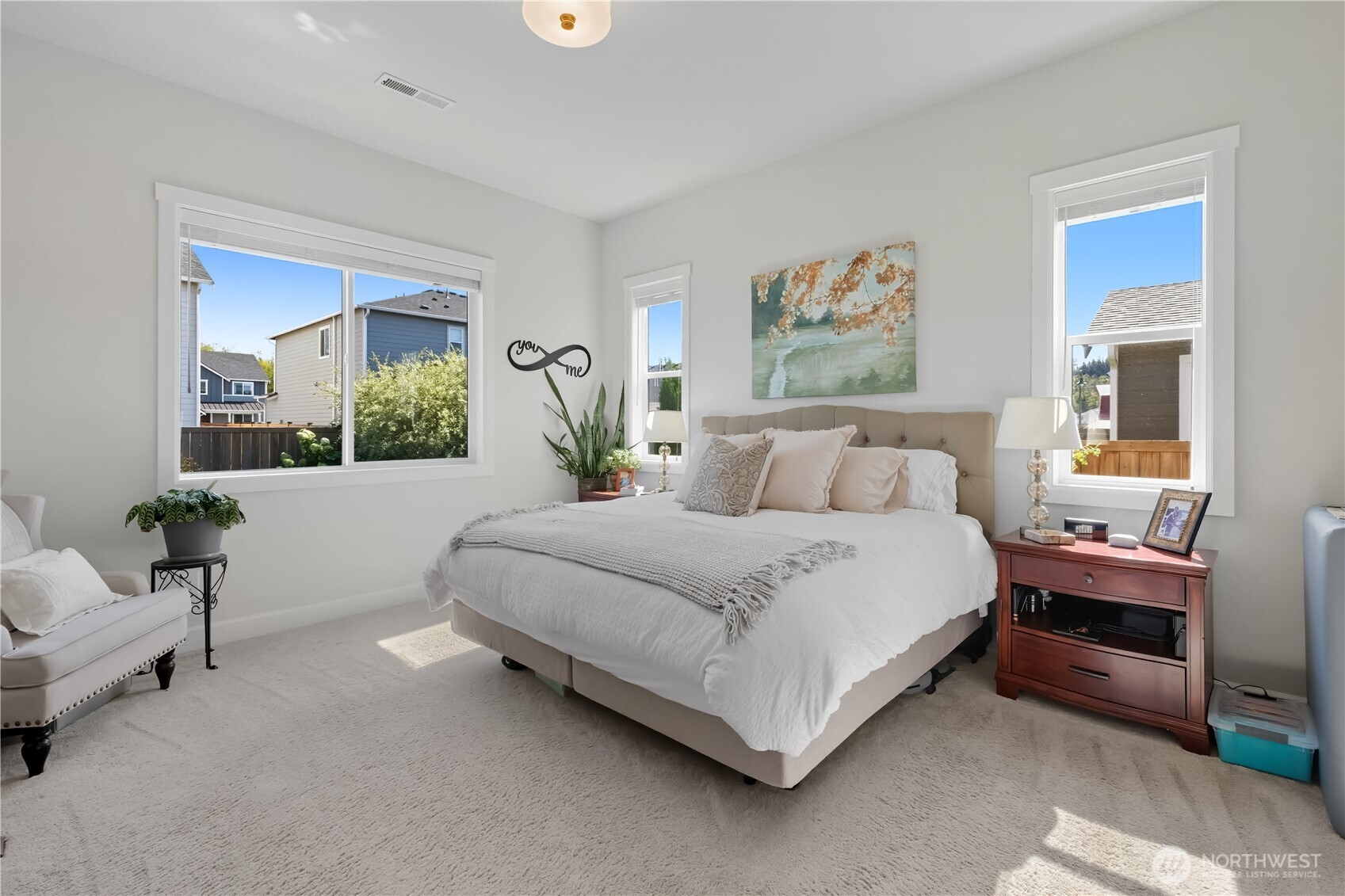 630 South Knowles Street Buckley, WA 98321 - Photo 12 of 29 a bedroom with a bed and a couch