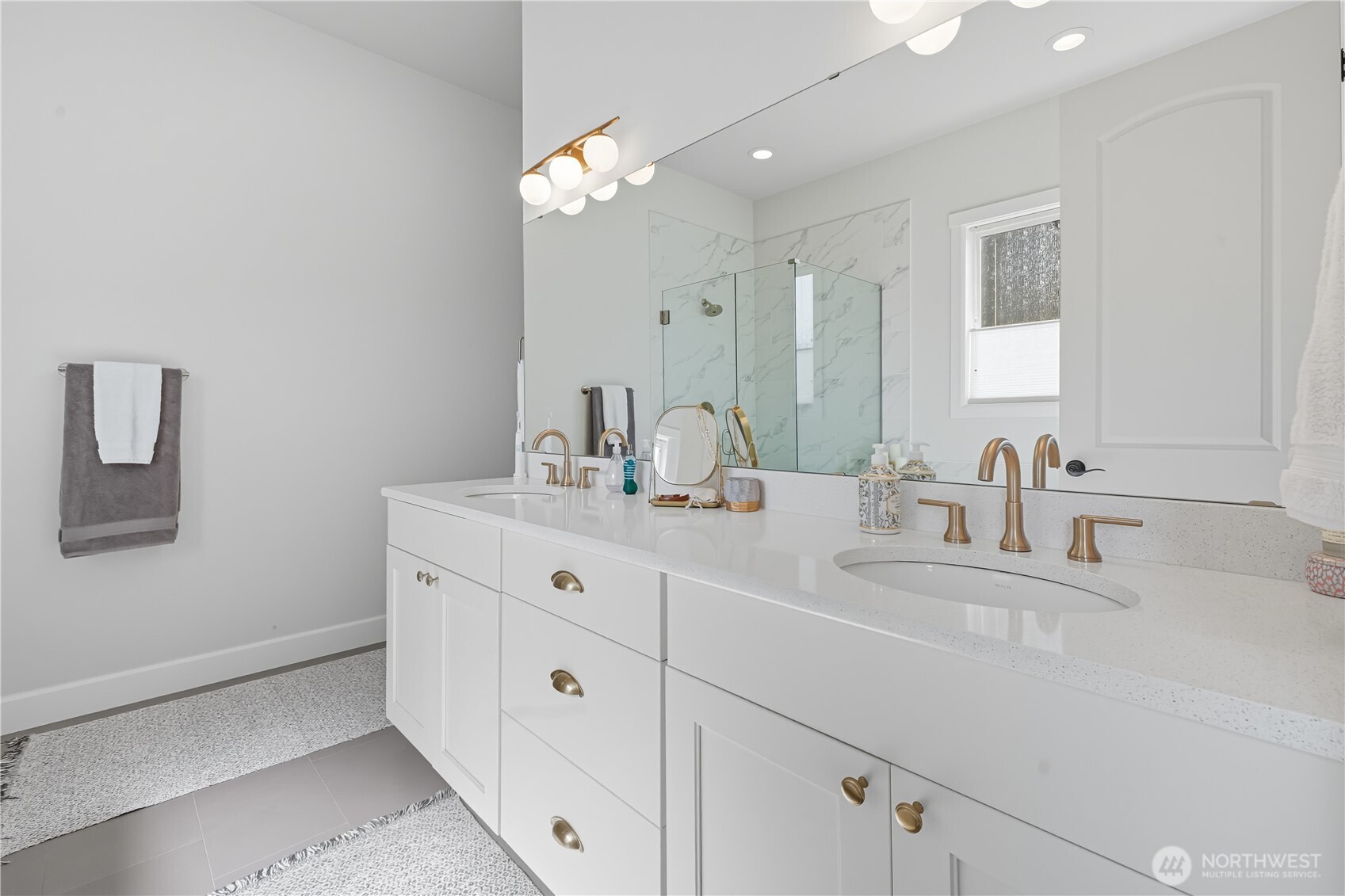 630 South Knowles Street Buckley, WA 98321 - Photo 14 of 29 a bathroom with double sink and a mirror