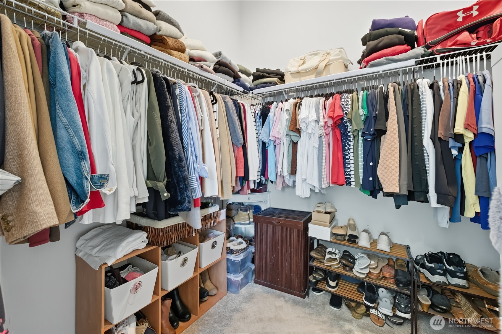 630 South Knowles Street Buckley, WA 98321 - Photo 16 of 29 a view of walk in closet with clothes