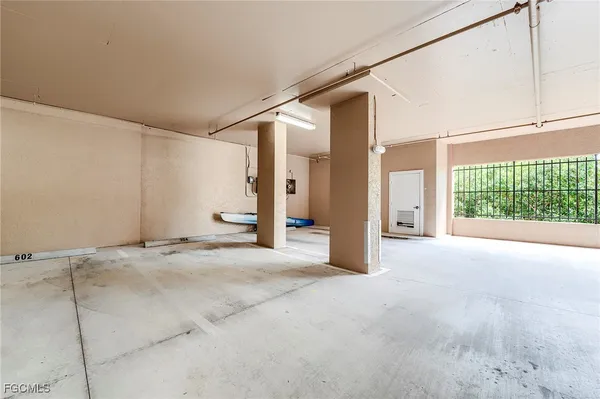 a view of empty room with floor to ceiling window