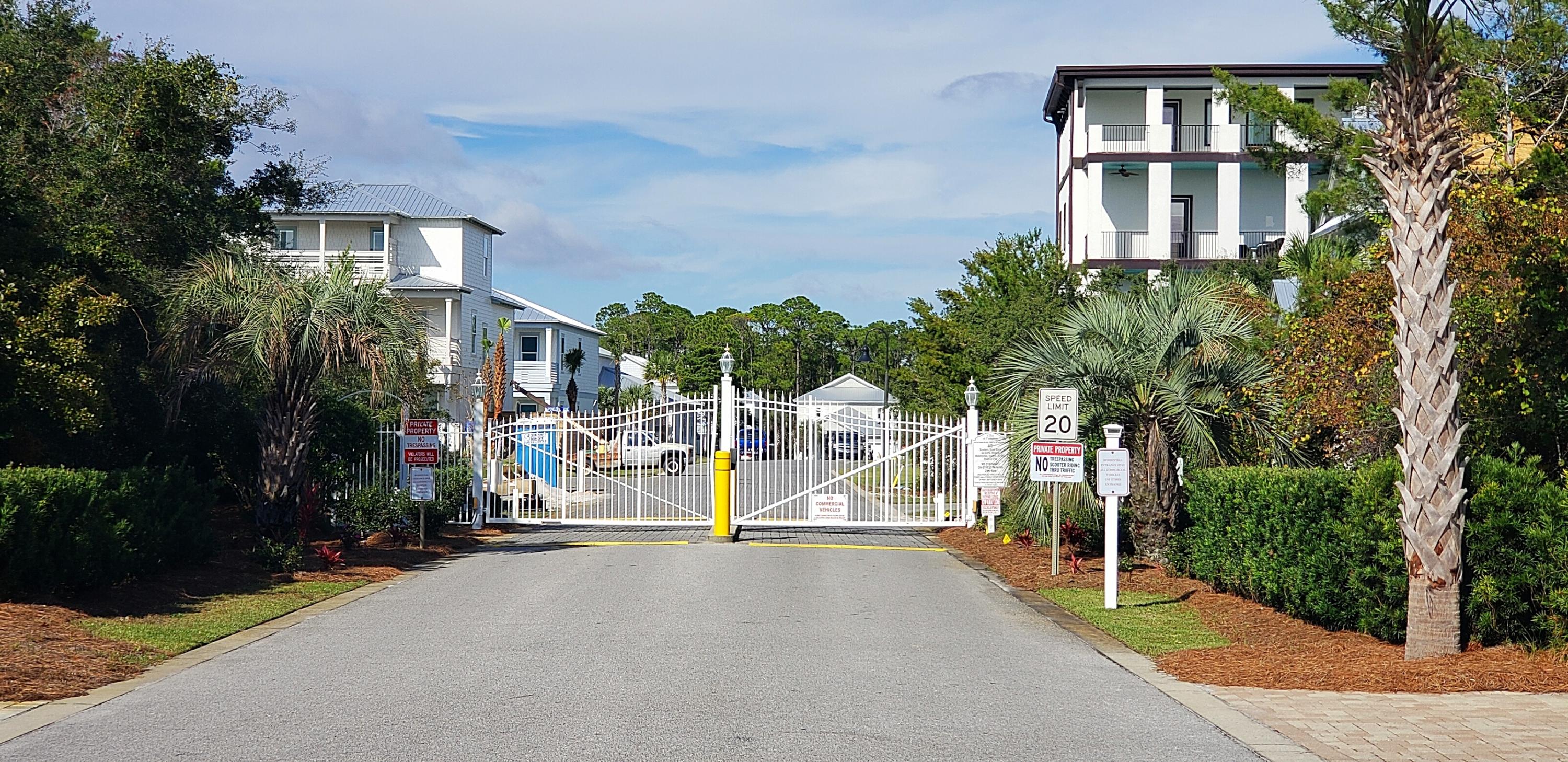 55 Shelley's Way Miramar Beach, FL 32550 - Photo 5 of 15 a view of a brick building next to a yard
