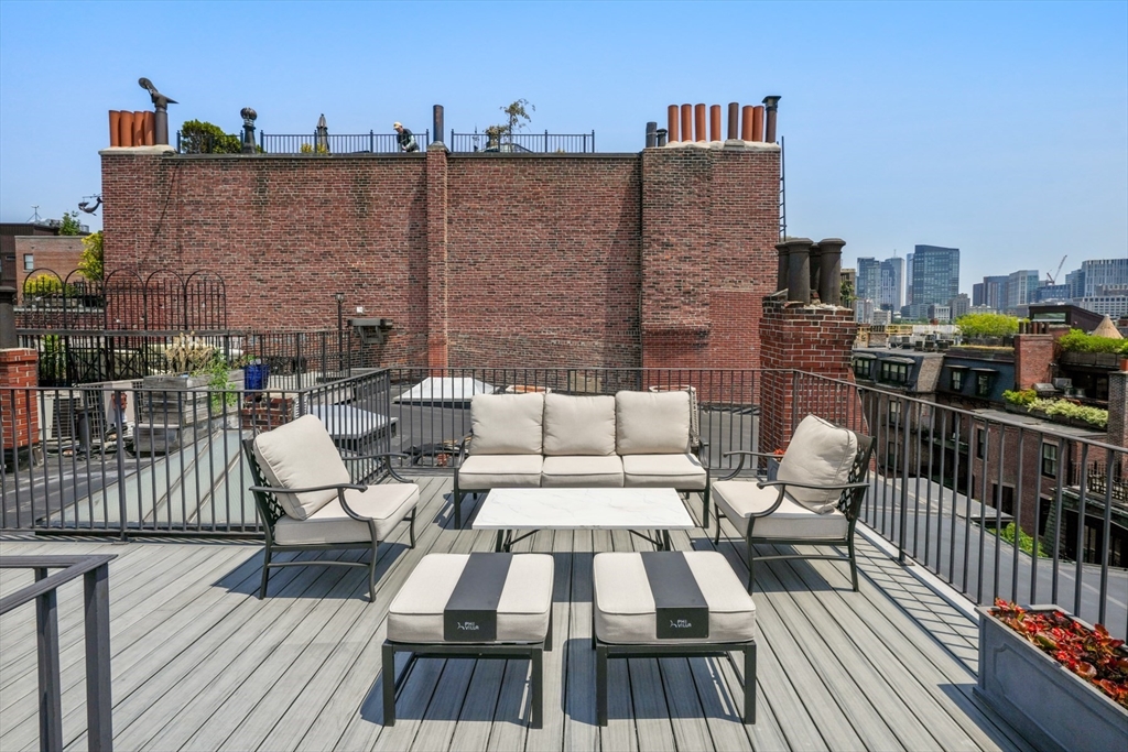 129 Beacon Street, Unit PH Boston, MA 02116 - Photo 27 of 40 a view of roof deck with patio
